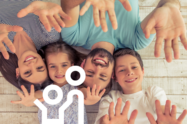 Picture of a family taken from above.