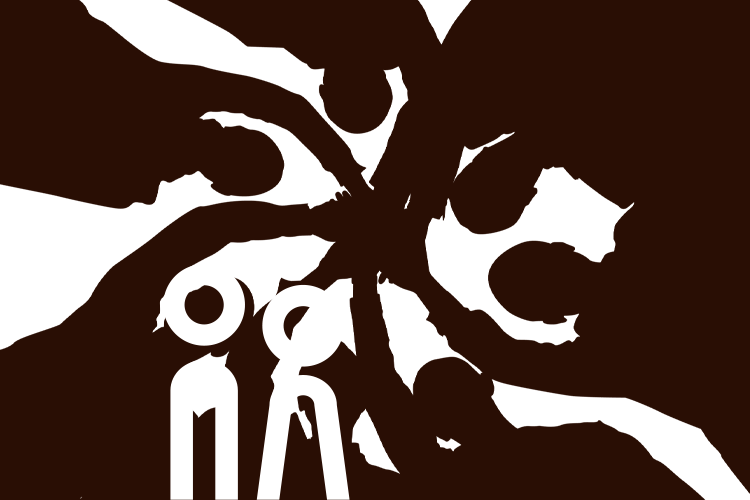 A small circle of people viewed from below with their palms placed on top of each other to form the centre.